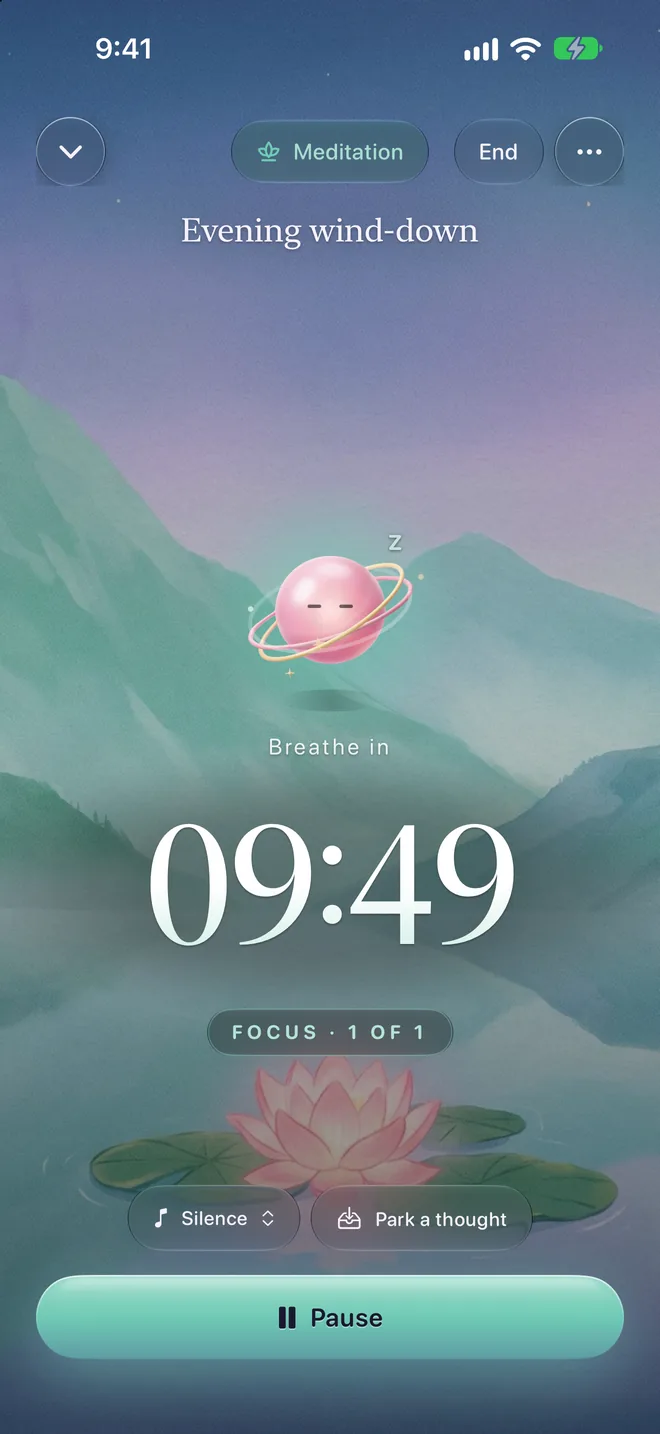 A Meditation session over Mountain Mist: Orbilla with its eyes closed above the countdown, and the cue Breathe in.