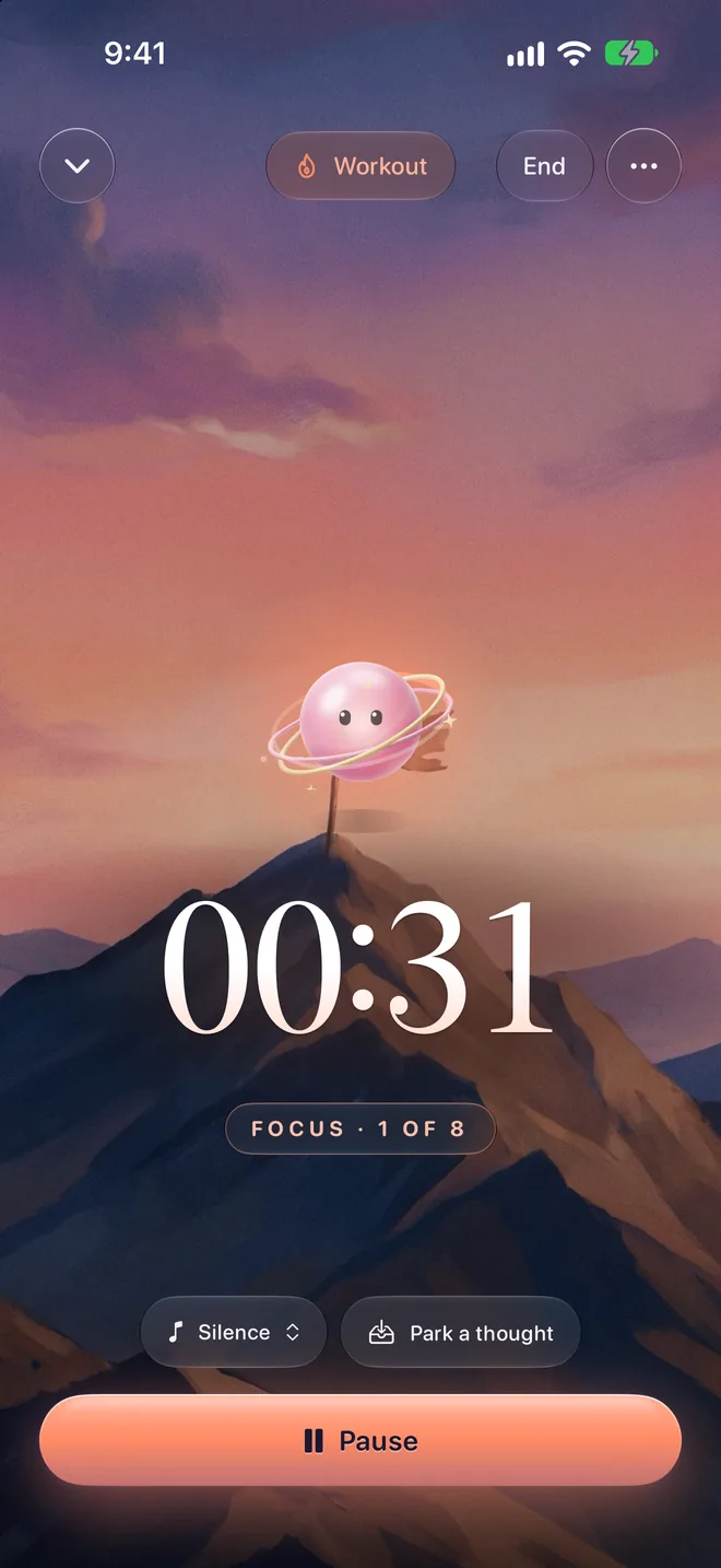 A Workout interval at 00:31, focus 1 of 8: Orbilla on a mountain top at sunset.